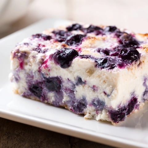 Golden-brown Blueberry Cottage Cheese Bake, baked to perfection with juicy blueberries, ready to serve.