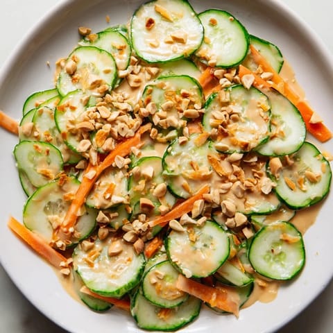 Cool, refreshing Thai-Style Peanut Cucumber Salad: a colorful mix perfect for a light vegetarian lunch.